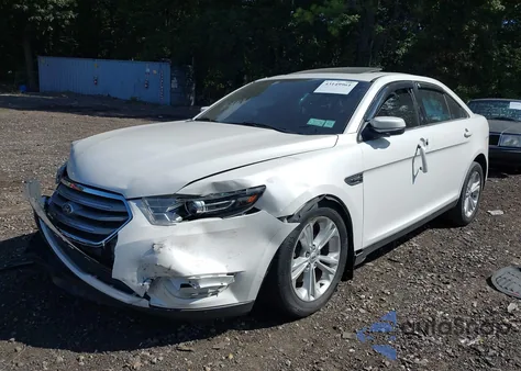 2015 Ford Taurus Sel z USA, uszkodzony, nr VIN 1FAHP2E84FG169274